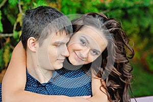 Young happy smiling attractive couple together outdoors