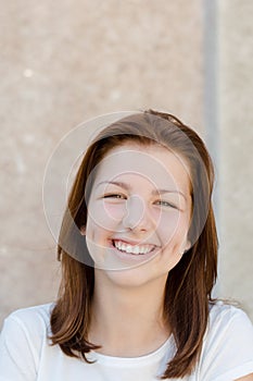 Young happy smiling teenage girl portrait