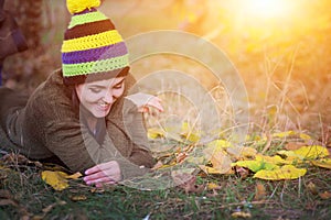 Young happy smiling woman portrait, resting outdoor in park