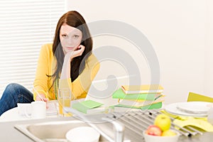 Young happy student girl studying at home