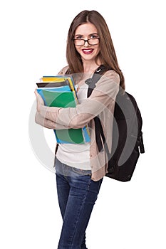 Young happy student with notebooks