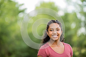 Young happy teen girl laughing and smiling.