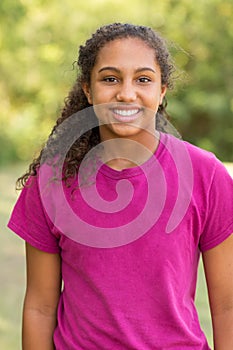 Young happy teen girl laughing and smiling.