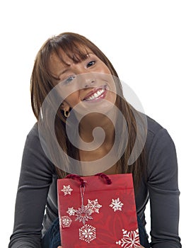 Young happy woman with Christmas gift