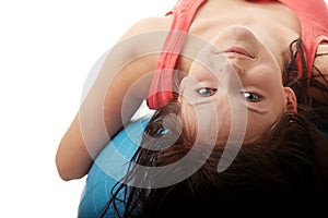 Young happy woman doing fitness exercise