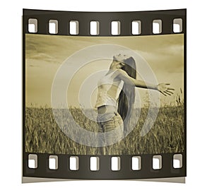 Young happy woman in field