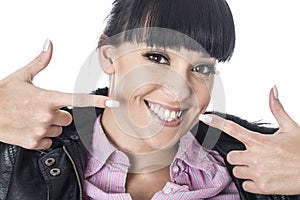 Young Happy Woman Pointing Both Fingers at her Lovely Smile