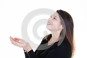 Young happy woman presenting looking blank empty space your product