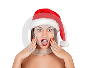 Young happy woman in swimsuit and christmas hat. emotional woman in red santa claus hat isolated on white background. Happy Christ