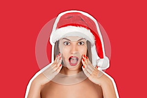 Young happy woman in swimsuit and christmas hat. emotional woman in red santa claus hat Magazine collage style with trendy color