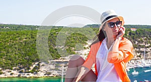 Young happy woman-tourist outdoors in Bonifacio