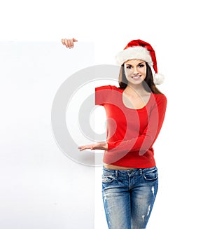 Young and happywoman in a Christmss hat with a banner