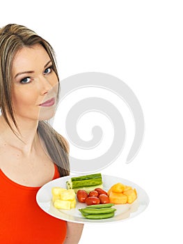 Young Healthy Attractive Woman Eating Five A Day Fruit and Vegetables