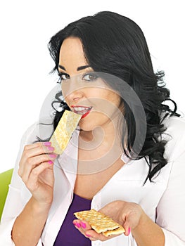 Young Healthy Attractive Woman Eating Thin Mixed Dried Fruit Bars