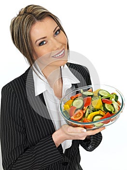 Young Healthy Business Woman Eating a Fresh Mixed Salad