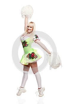Young high school female dancer standing with pom-poms on isolated white background.