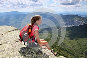 Young hiker on mountain top photo