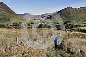 Young hiker on walking path to Spittal of Glenshee. Cateran Trail, Scotland