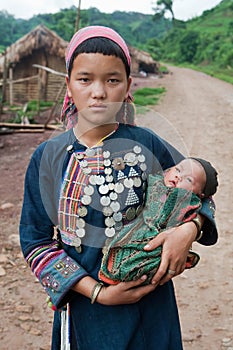 Young hill tribe mother with baby photo