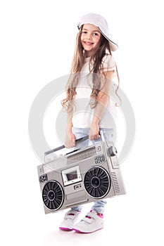 Young hip hop girl listening music on boombox retro radio, ghetto blaster, isolated on white background