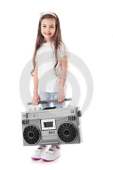 Young hip hop girl listening music on boombox retro radio, ghetto blaster, isolated on white background