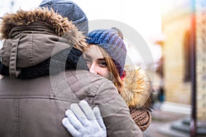 Young hipster couple enjoy in winter city park outdoor