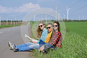 Young hipster friends travel on road