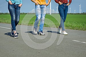 Young hipster friends travel on road