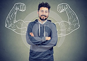 Overconfident man with strong hands photo
