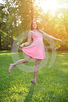 Young hipster model woman Casual Girl in field in Sunset in spring, summer landscape background Springtime Summertime. Allergic t