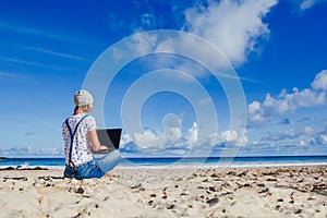 Young hipster woman working outdoor