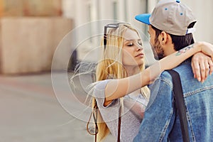 Young hipsters couple in love outdoor photo