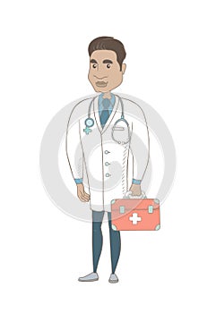 Young hispanic doctor holding first aid box.