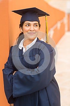 Young hispanic female graduate at her graduation