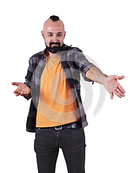 Young hispanic man pointing at something with disdain photo