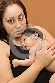 Young Hispanic Mother and Newborn Infant photo