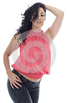 Young Hispanic Woman Posing In A Pink Top and Black Jeans