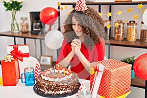 Young hispanic woman smiling confident celebrating birthday at home