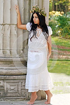 Young Hispanic woman wearing a flower wreath