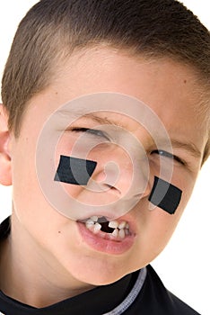 Young hockey player snarling