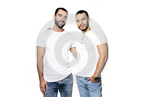 Young homosexuals gay couple love each other on a white background.