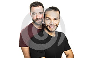 Young homosexuals gay couple love each other on a white background.