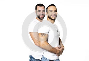 Young homosexuals gay couple love each other on a white background.