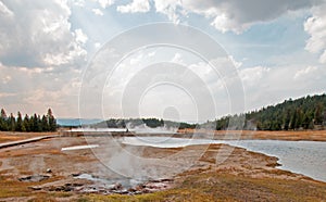 Young Hopeful Geyser next to Firehole Lake in the Lower Geyser Basin in Yellowstone National Park in Wyoming USA