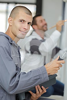 young house painter looking at camera