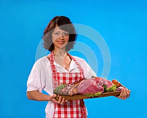 Young housewife offers meat products