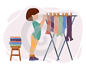 A young housewife woman hangs clothes on a dryer and laundry on a stool. Illustration