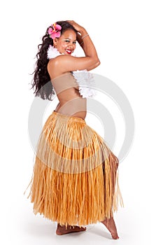 Young hula dancer looking over her shoulder