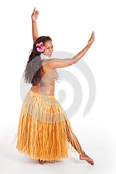 Young hula dancer looking over her shoulder