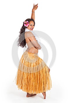 Young hula dancer looking over her shoulder